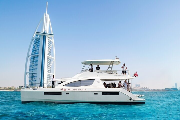 Experience the allure of Dubai’s coastline aboard a luxurious yacht savoring delightful meals while enjoying stunning views of iconic landmarks like the Burj Al Arab. Perfect for relaxation and exploration.